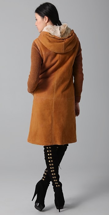 Long Black Coat with Long Boots: Fashion for the Winter Season