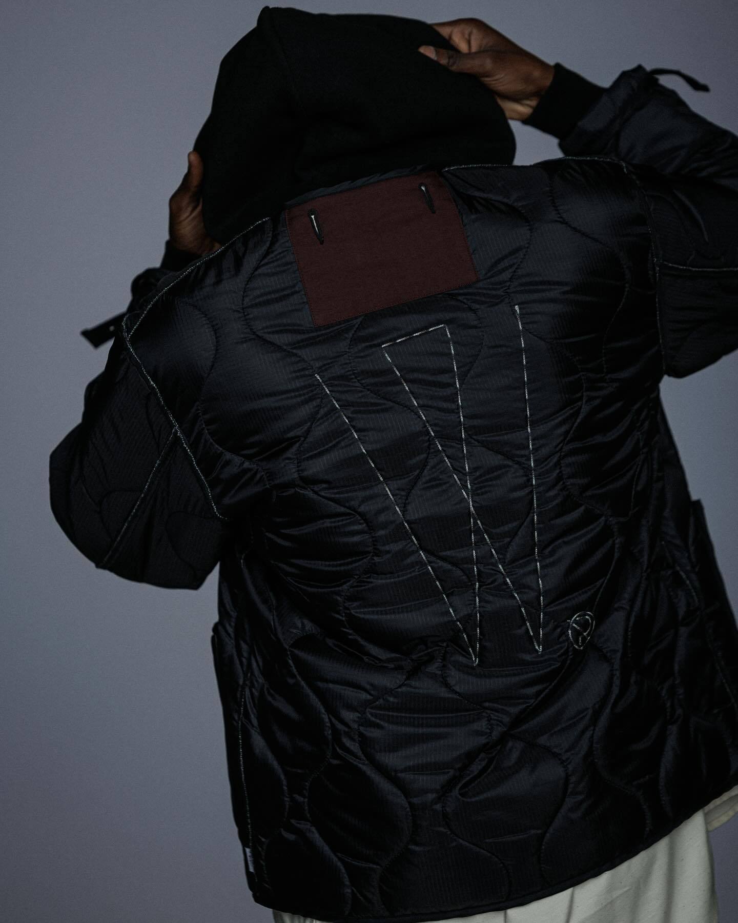 CHAMPION DOWN COAT: A WINTER ESSENTIAL FOR SPORTS FANS