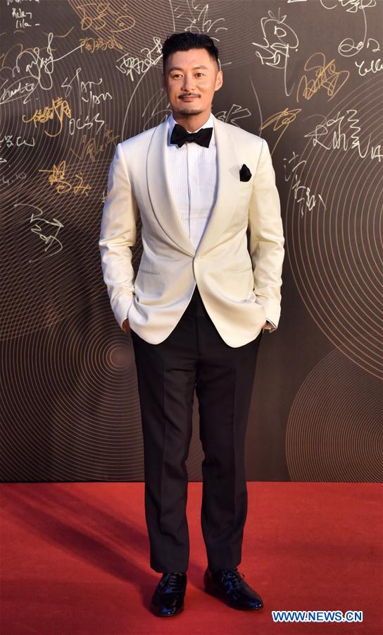 Mr. Chow: The Iconic Style of Hong Kongs Legendary Actor in his Finest Suits