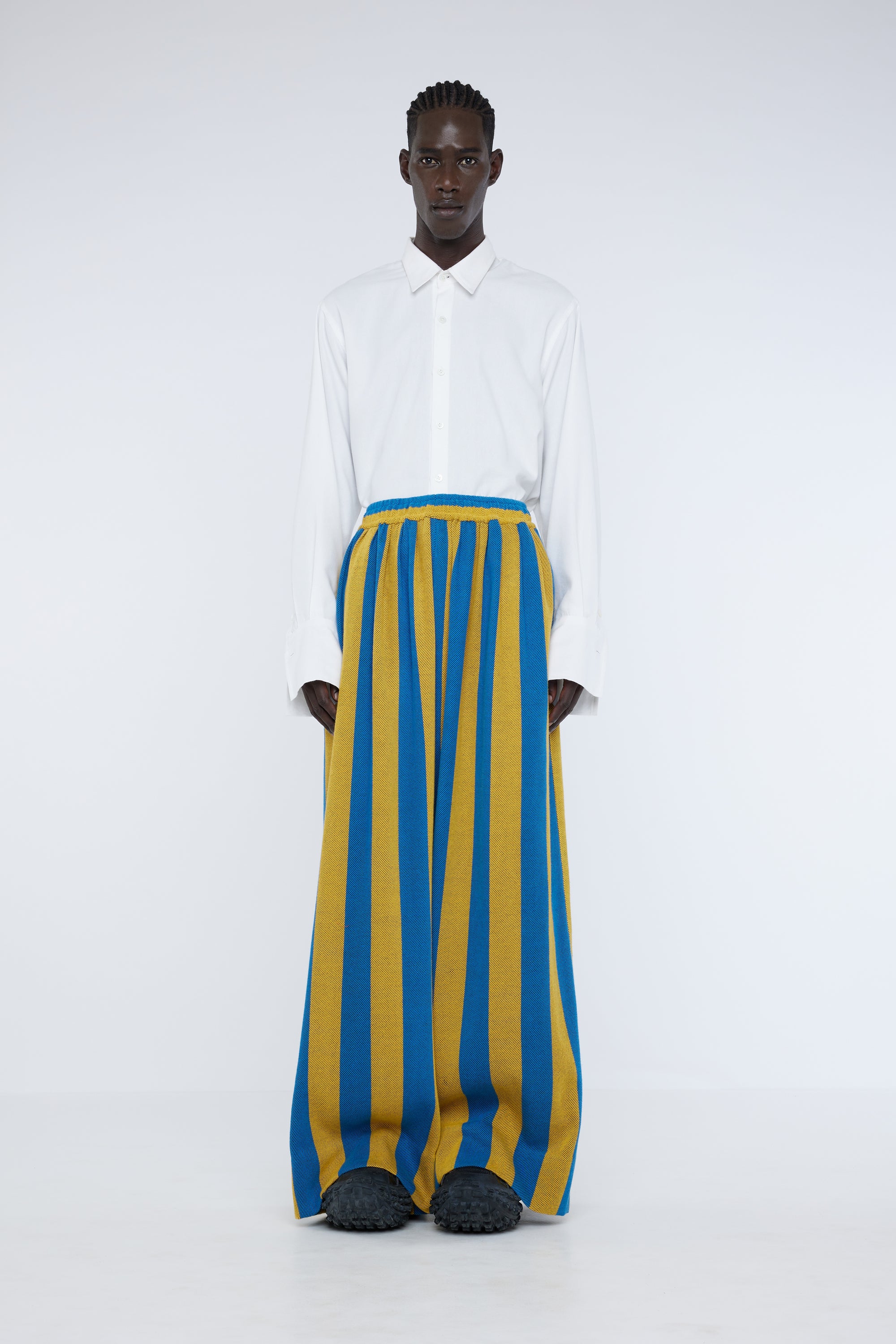Title: Mastering the Art of Wearing Striped Suits with Complimentary Blouses