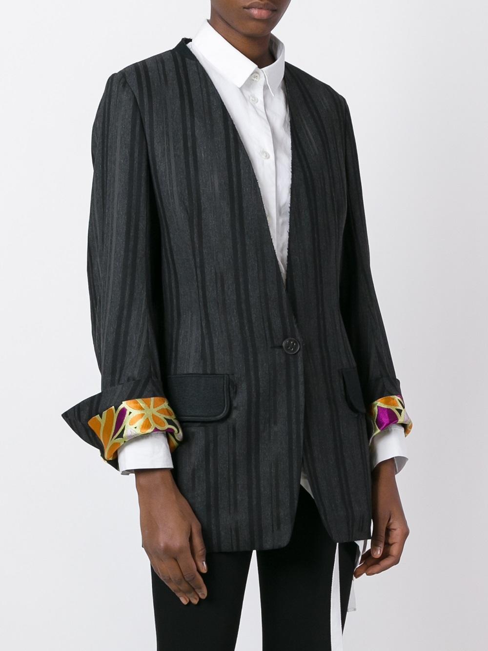 Title: Mastering the Art of Wearing Striped Suits with Complimentary Blouses