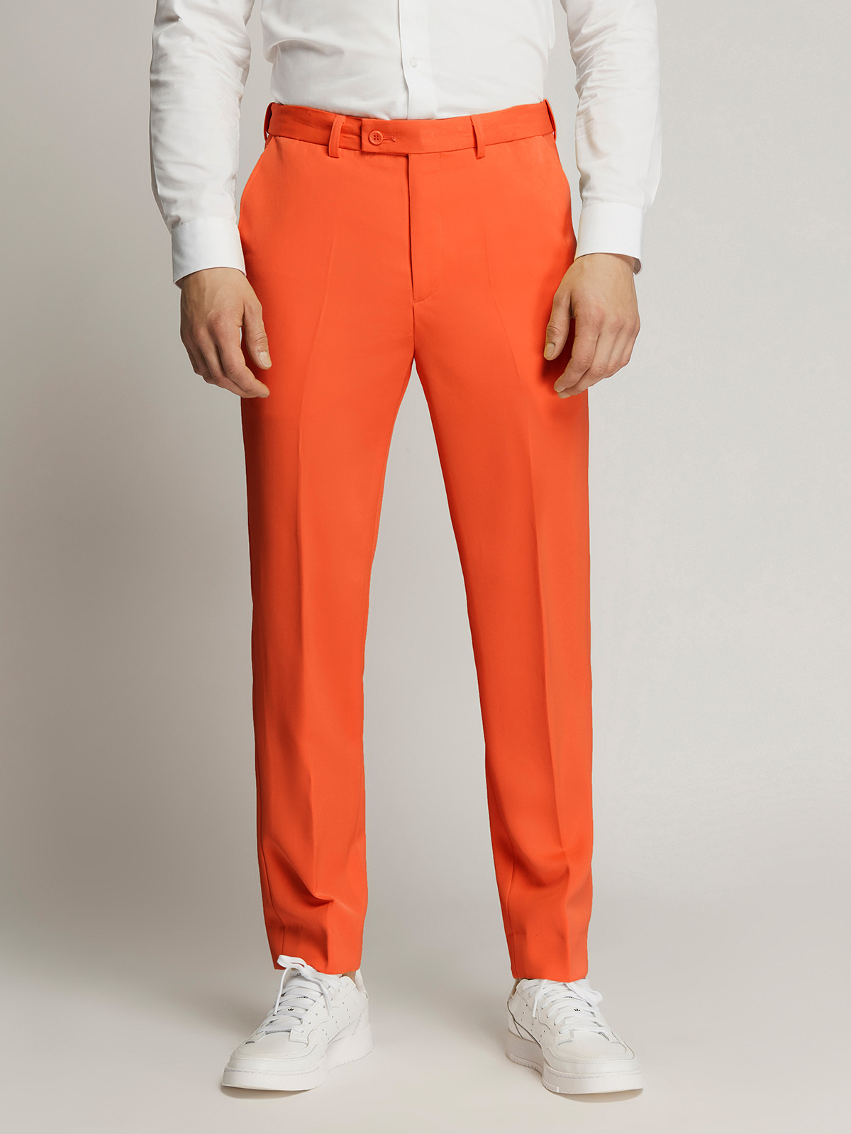 What Pants to Wear with an Orange Jacket?