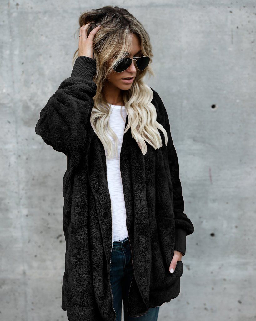The Debate on Which is Warmer: Fur or Down Jacket?