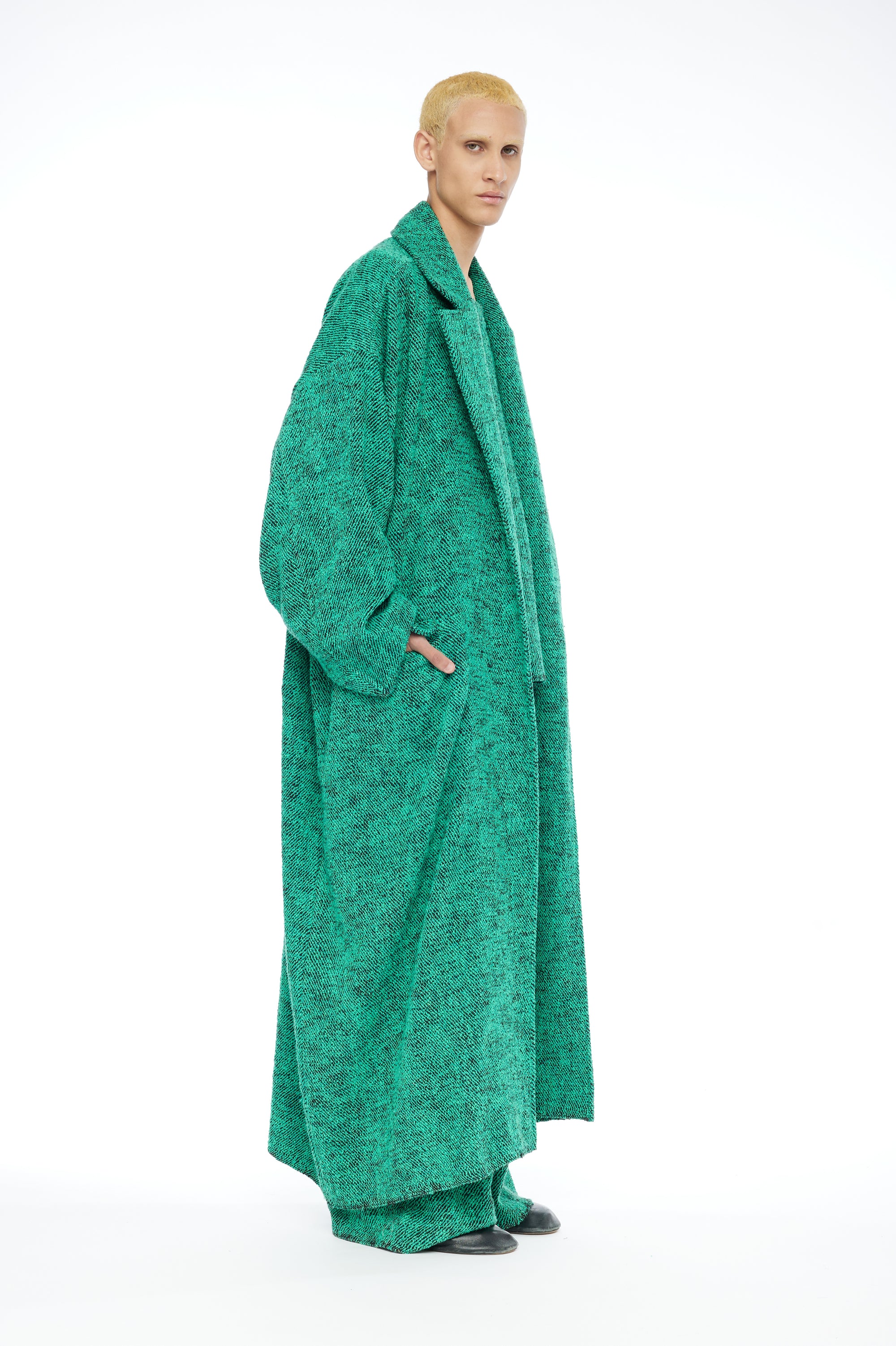 Deep Green Winter Coat with a Scarf: Fashionable and Practical