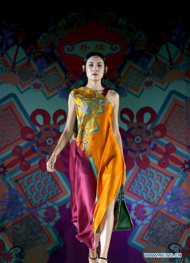 Title: Embracing Chinese Culture: A Fashionable Journey through Chinas Ancient Traditions in Womens Clothing
