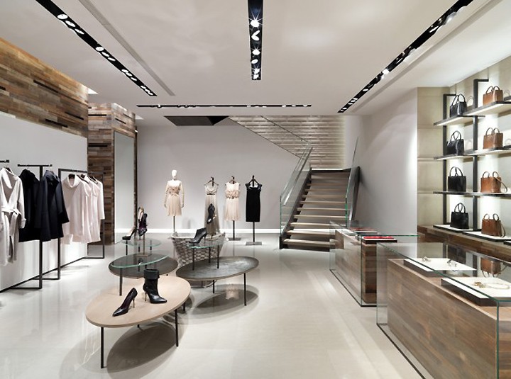 女性时尚店设计效果图展示，创意与舒适并存的现代女装店