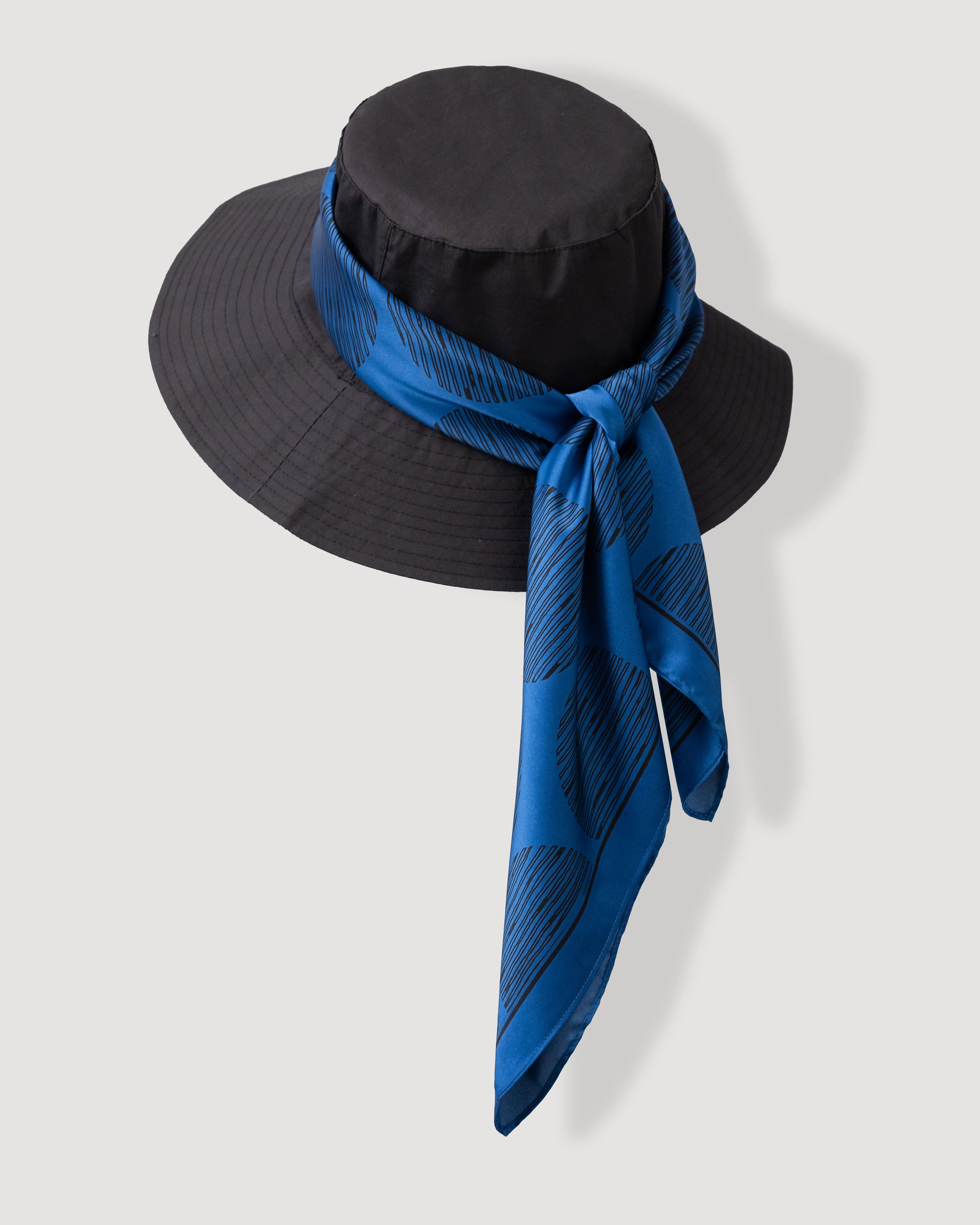 Title: The Transformation of a Scarf into a Hat: A Creative Craft Project