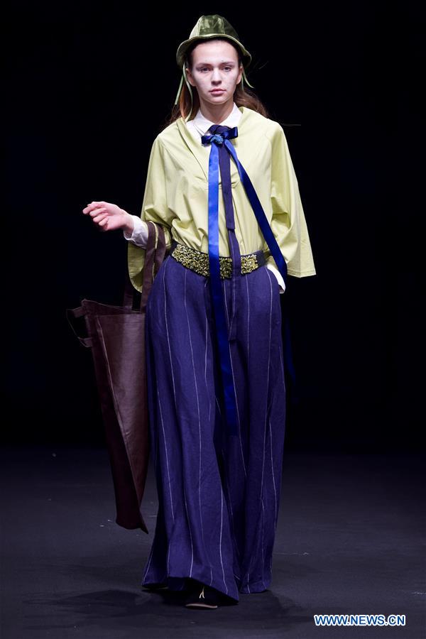Title: Celebrating Gender Fluidity: The Beauty of Jin Zhenhuans Womens Wear