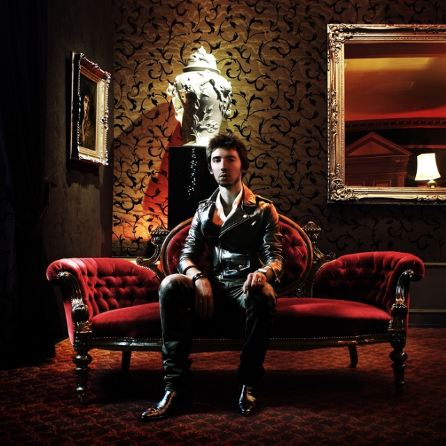 The Allure of a Red Scarf: A Gentleman’s Fashion Statement