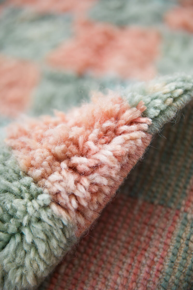 Title: The Colorful Knitted Rug