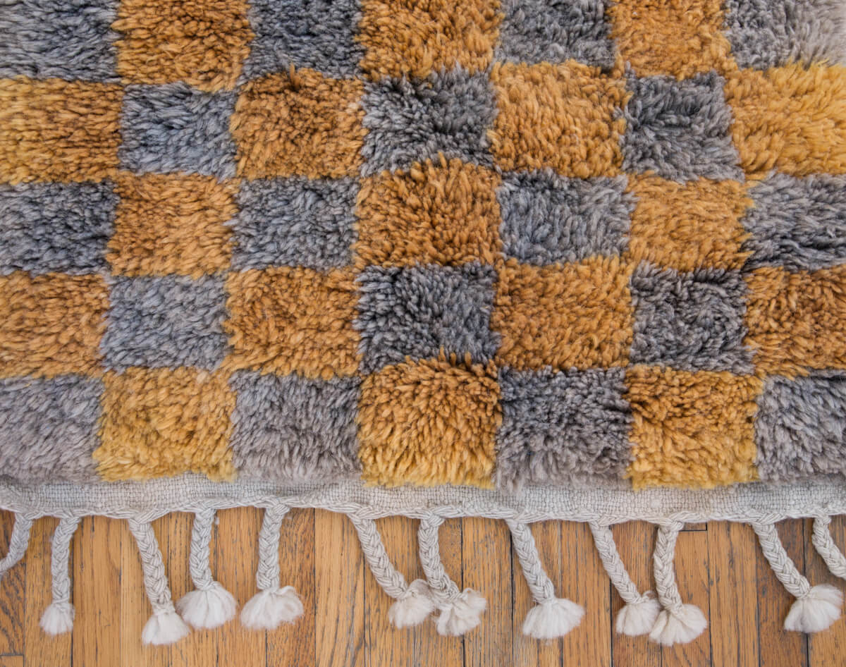 Title: The Colorful Knitted Rug