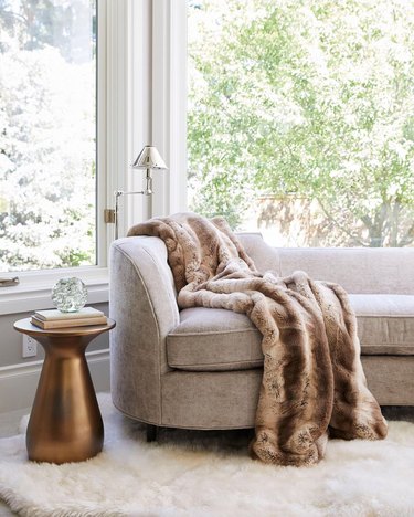 Title: The Perfect Pairing: Brown Sofa with a Trendy Window Curtain
