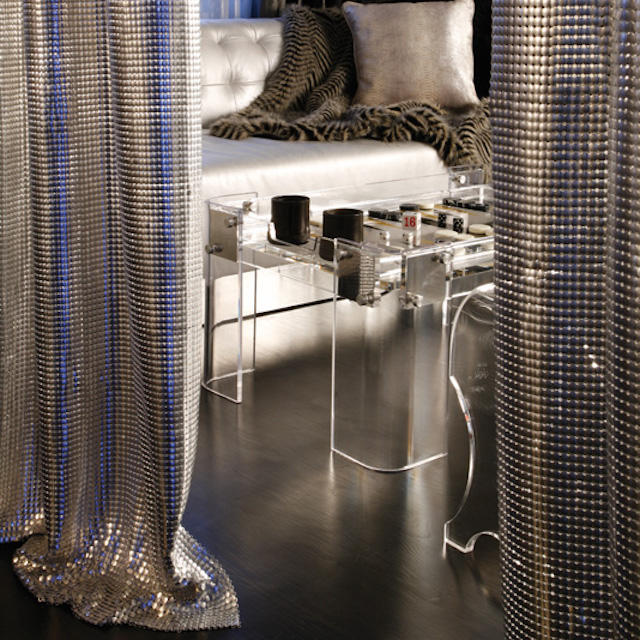 A Reflection of Sophistication: The Majestic Allure of a Dark Grey Sofa and Curtains