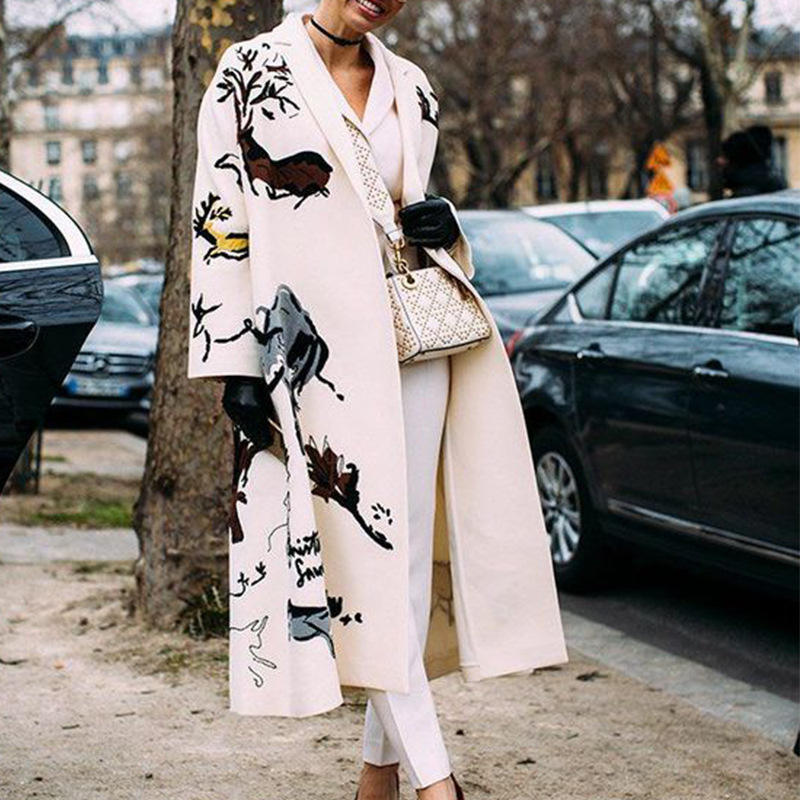 Title: The Luxurious Cashmere Coat: A Fashion Statement for the Discerning Individual